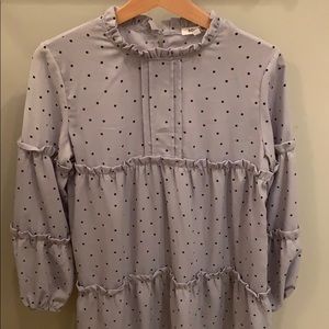 Polka dot dress with ruffles and ruffled collar